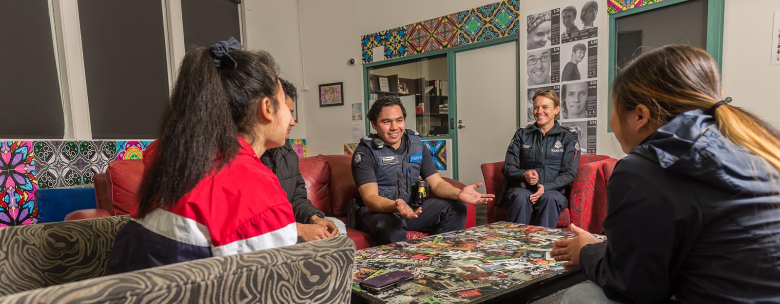 Police officers speak with young people at youth centre