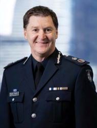 Decorative photo of Shane Patton, APM Chief Commissioner, Victoria Police. He is smiling and in Victoria Police Dress Uniform