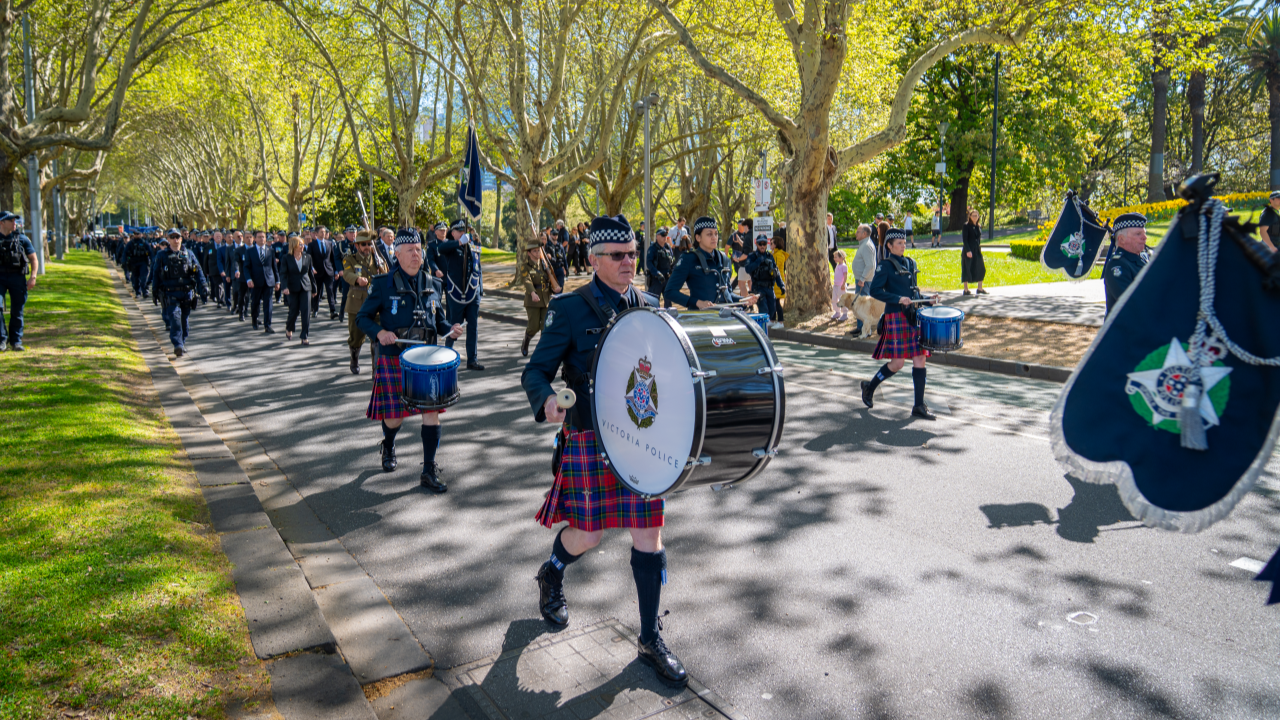 Victoria Police Band leads the march towards the Police Memorial. 